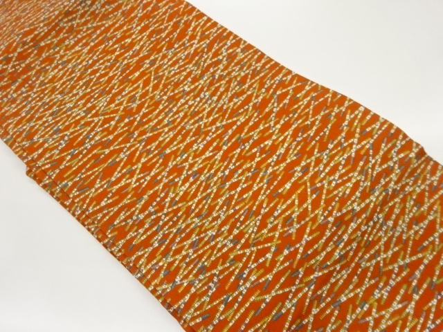 縮緬地笛尽くし模様名古屋帯